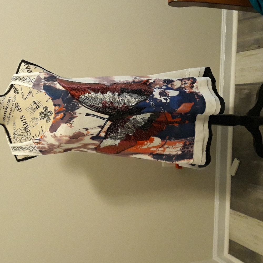NWT unique designer's  top  Fleur de Lis collection.